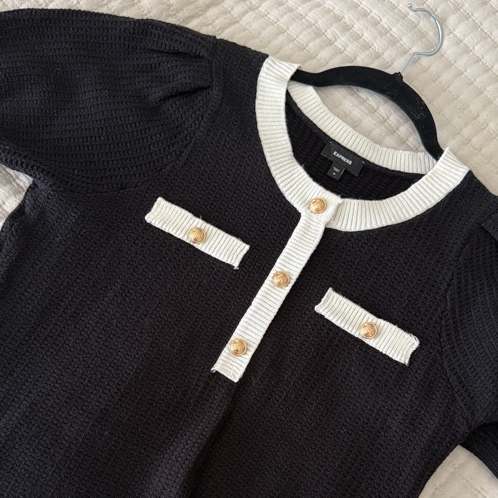 Express Elegant Black and White Sweater with Gold Accents